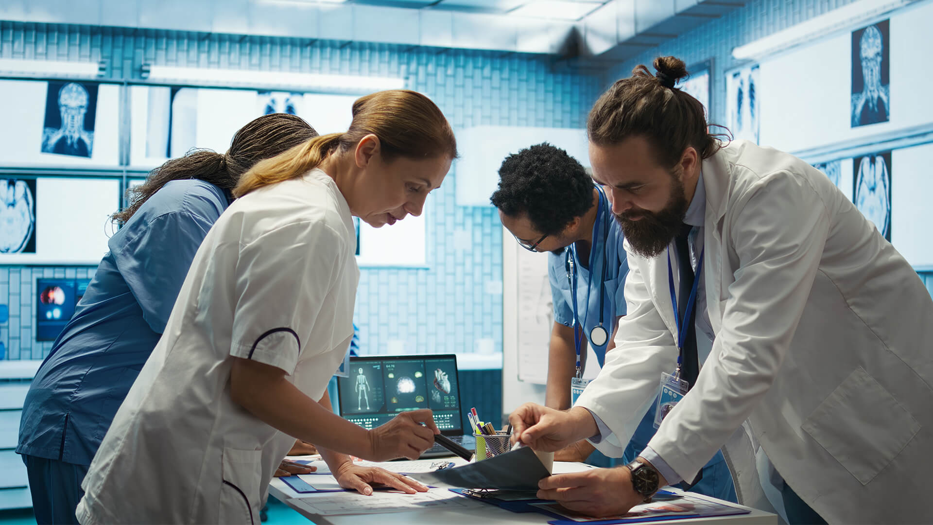Healthcare professionals ensuring quality performance meaures are taken before and after the examination room.