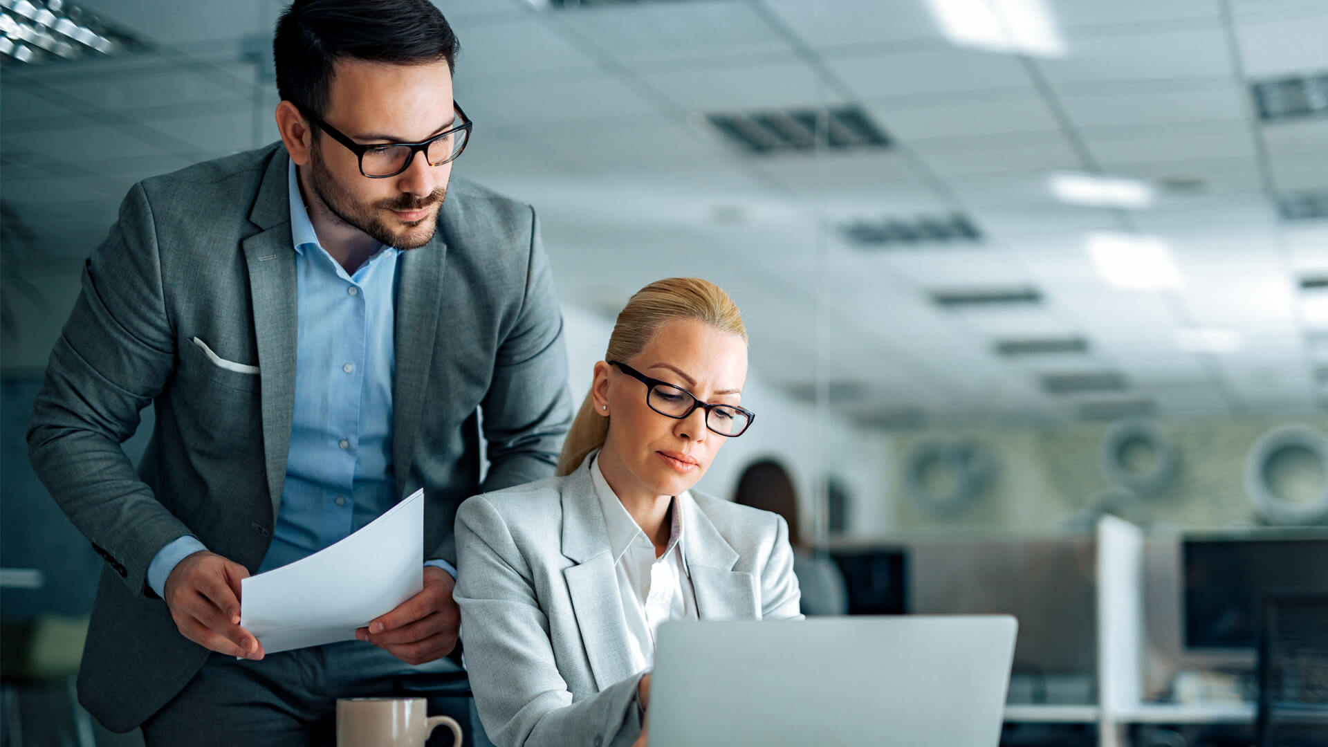 Project managers reviewing the project site leadership model for centrury old facility project.