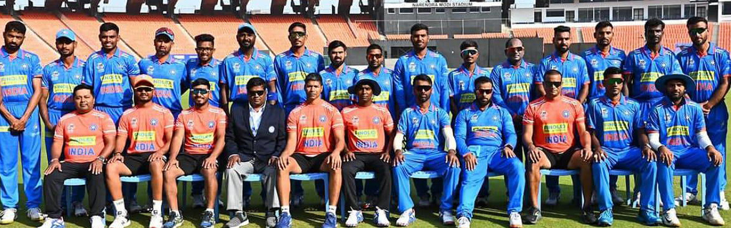 Large group of people smiling at camera