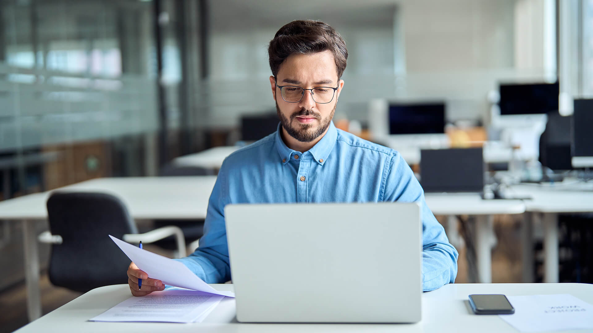 Male professional reviewing what has been released for the 2025 November jobs report. The data from the U.S. Bureau of Labor Statistics (BLS) is not availble and has been suspended due to the U.S. federal government shutdown.This report soley focuses on industy trends.