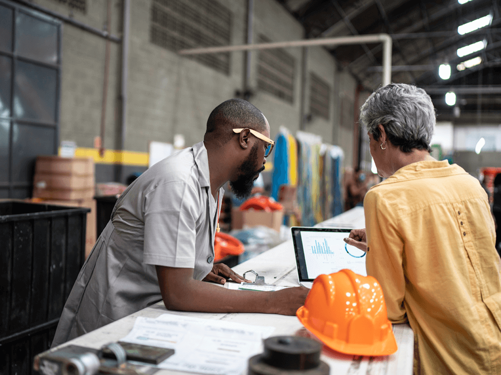 two men working in warehouse.