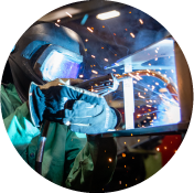 A welder welding pieces of metal together